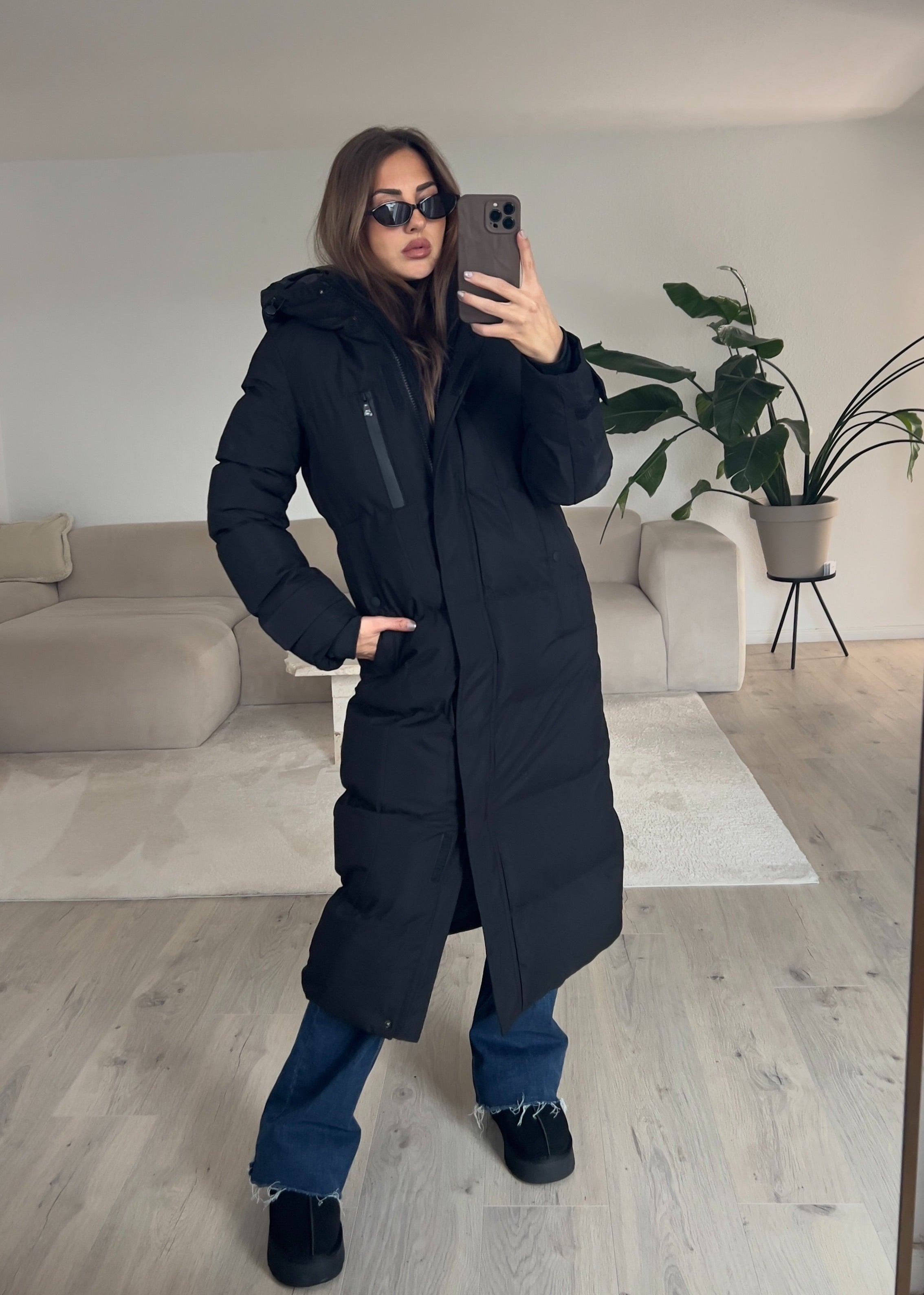 Lange Jacke mit Kapuze