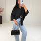 Oversize-Bluse mit Schmuckring-Detail Schwarz - NAHA